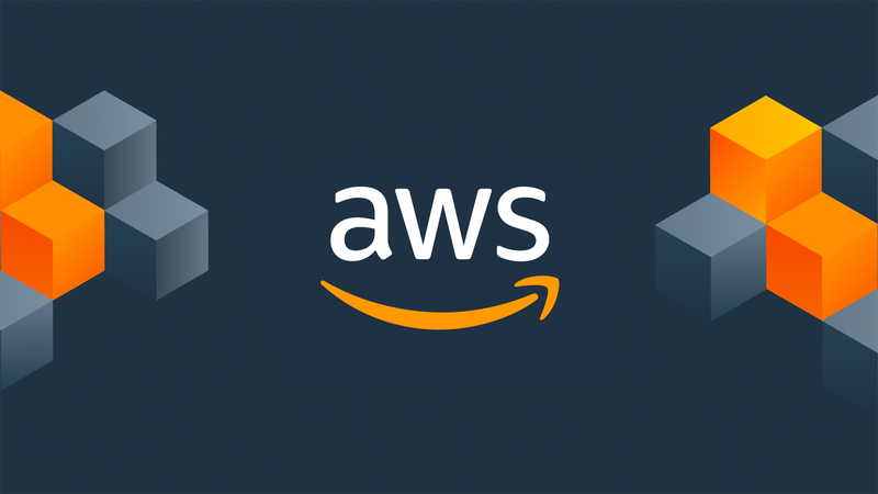 The AWS logo on a dark blue background, flanked by orange and grey isometric cubes